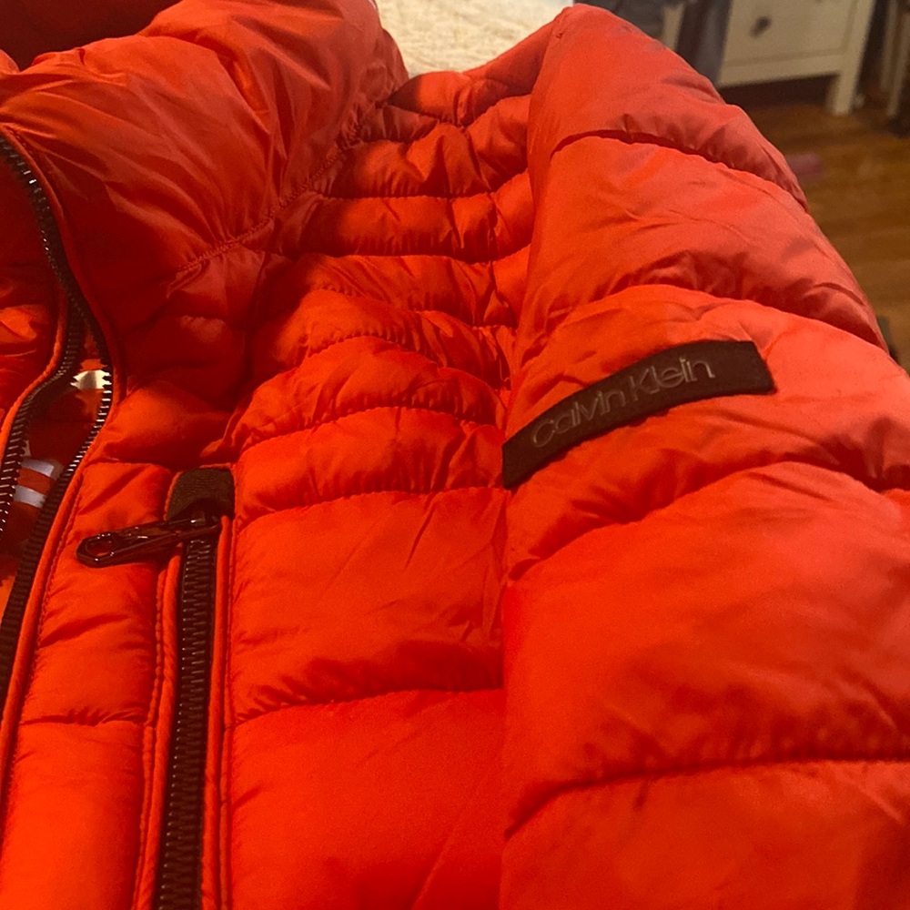 Calvin Klein water resistant orange puffer jacket great condition